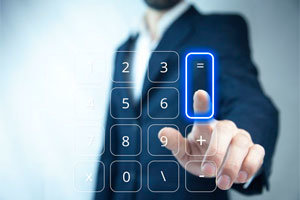 Businessman touching virtual calculator